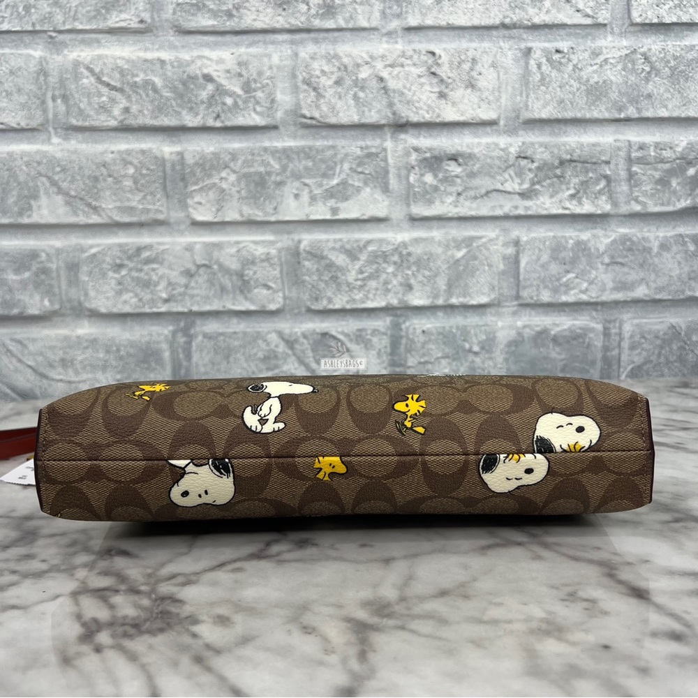 Coach X Peanuts Carry All Pouch In Signature Canvas With Snoopy Woodstock Print - Picture 6 of 11